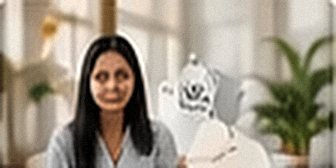 Clinic receptionist at a desk